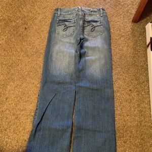 Jeans with design on back pockets